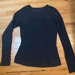 Lululemon black and blue heathered color athletic top. Size 6
